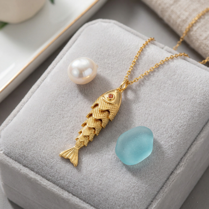 The Golden Catch Necklace: Each Purchase Directly Supports Communities In Need