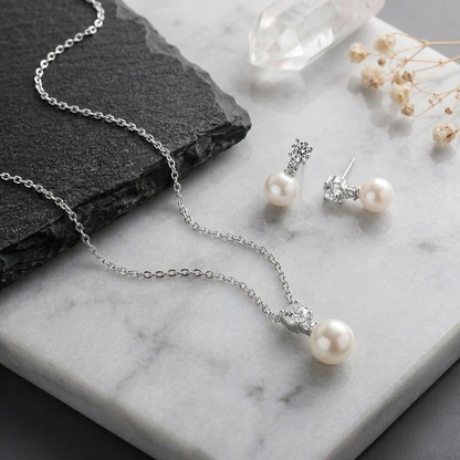Handmade Pearl Set Necklace + Earrings: Each Purchase Directly Supports Communities In Need